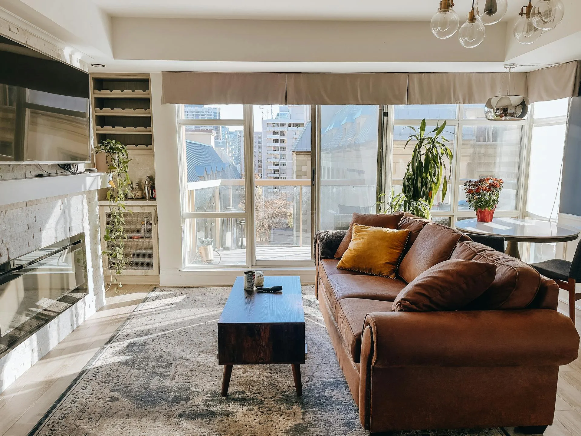 Beaumont entertainer extension interior post nano-ceramic solar film install — view preserved, afternoon temperature reduced, polished concrete unaffected