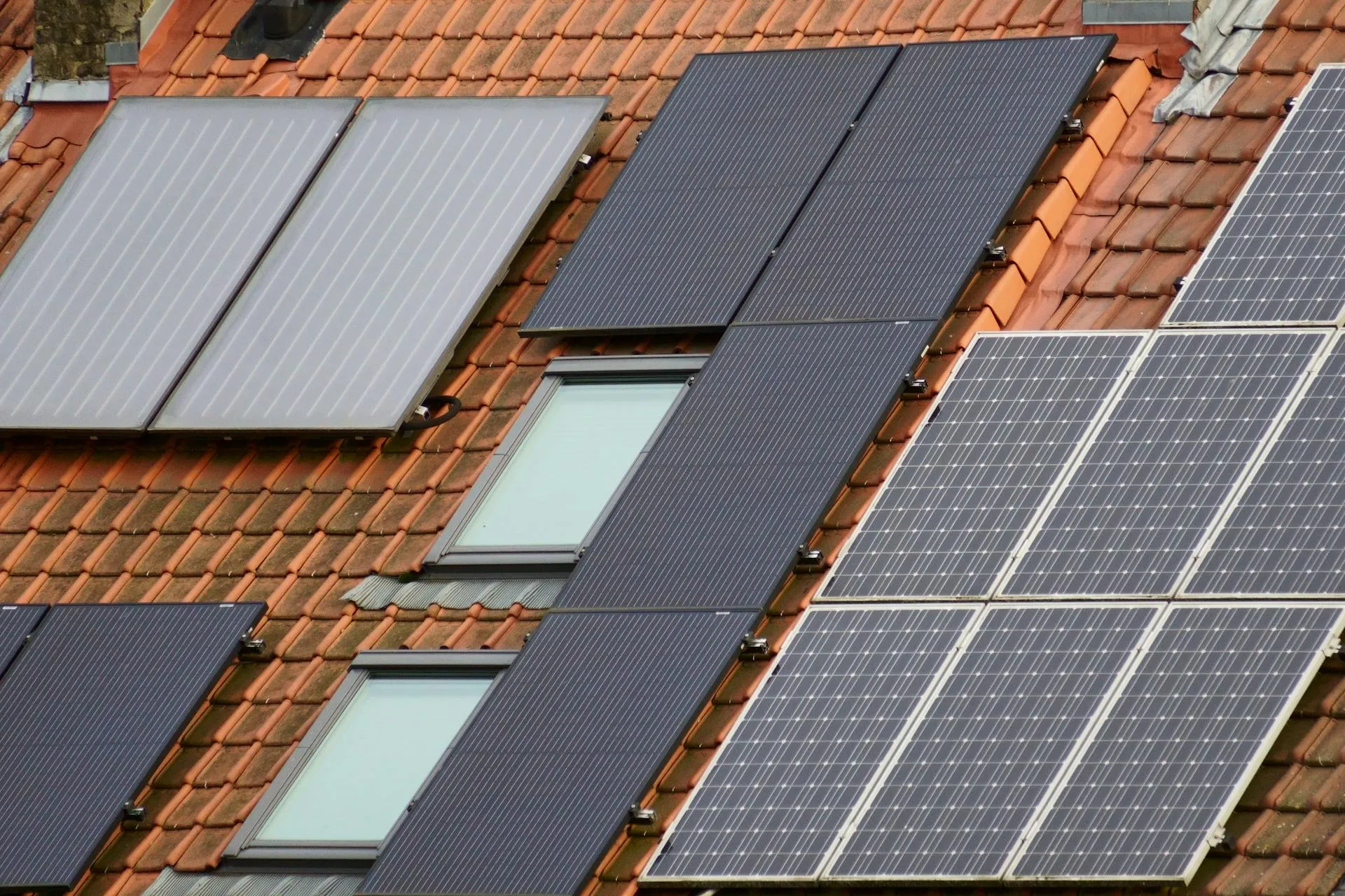 Rooftop solar panel installation in bright sunlight showing the typical residential array Adelaide systems use